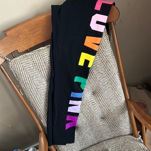 Size large rainbow logo vs pink leggings